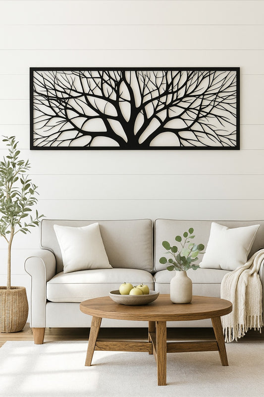 Living room with a white sofa, wooden coffee table, and decorative wall art.