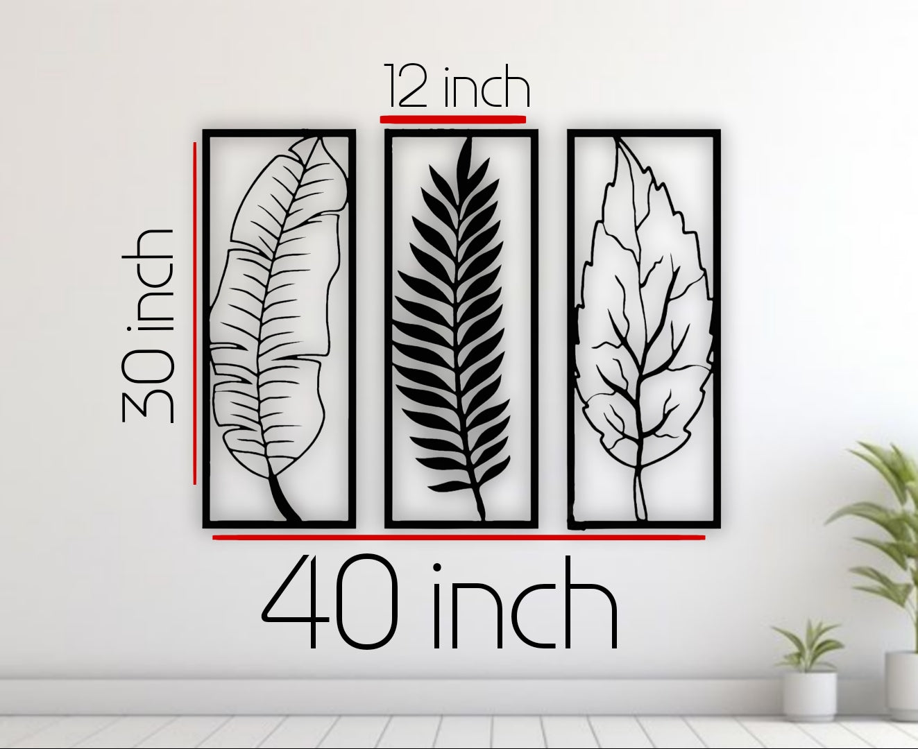 Three leaf-shaped wall art pieces with measurements on a white wall.