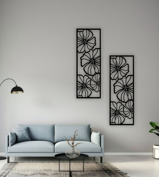 Black floral wooden wall art panel set of 2, measuring 11x30 inches, mounted above a modern light blue sofa in a minimalist living room with monochrome decor.