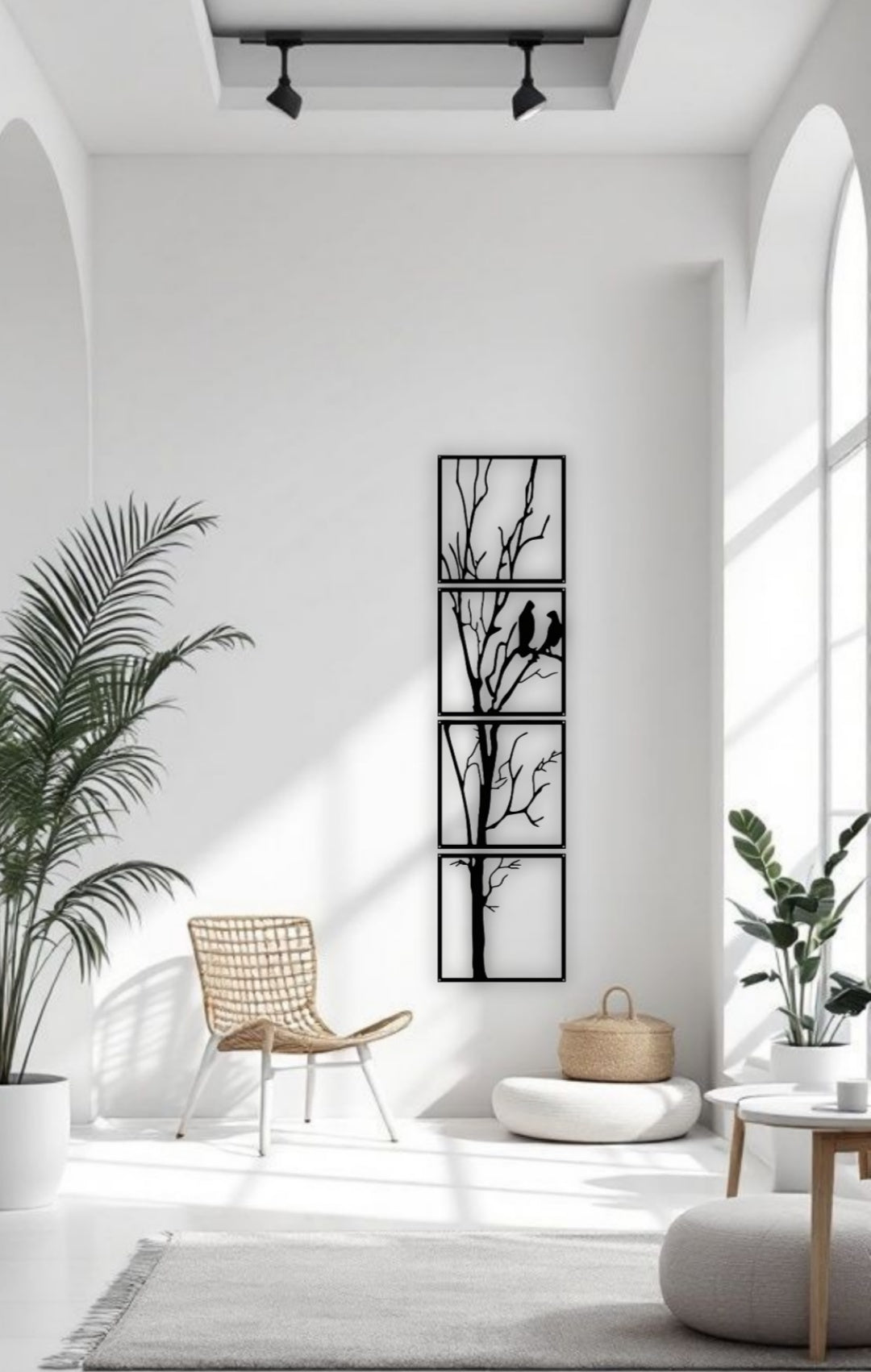 Black 4-panel vertical wooden wall art featuring a tree with two birds, total size 12x50 inches, mounted in a minimalist white interior with natural light and modern decor