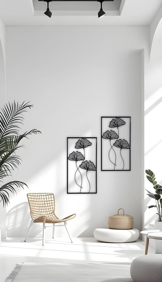 "Minimalist black floral wooden wall art displayed in a modern bright living room"