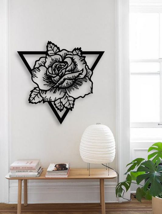 Geometric rose wall art in black wood finish, styled on a teal wall above a modern console table with minimalist décor elements.
