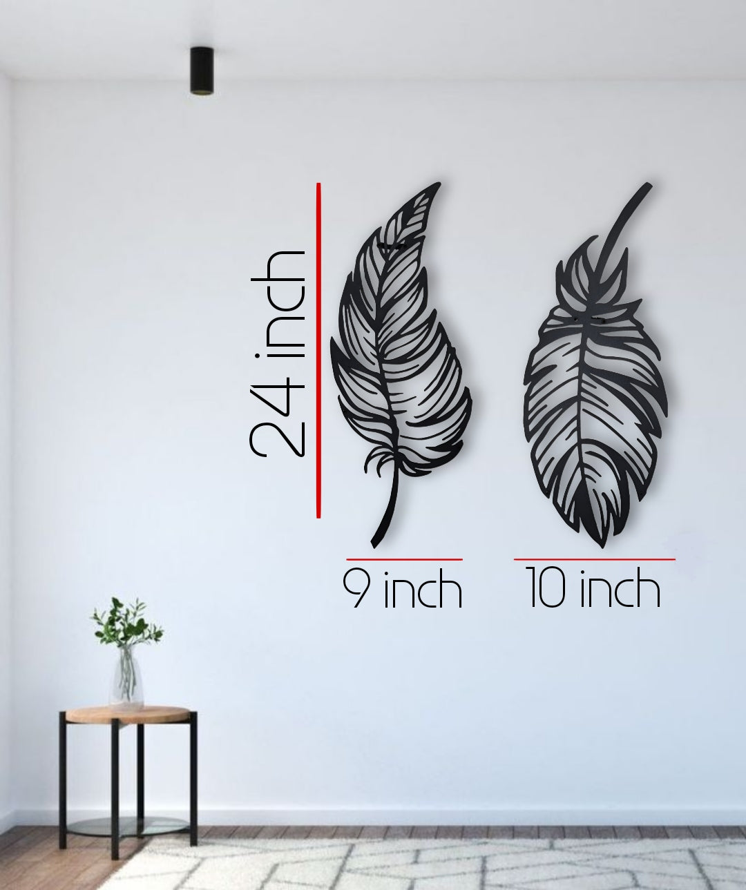 Stylish dual-feather wall art in matte black finish mounted on a blue paneled wall above a tufted sofa.