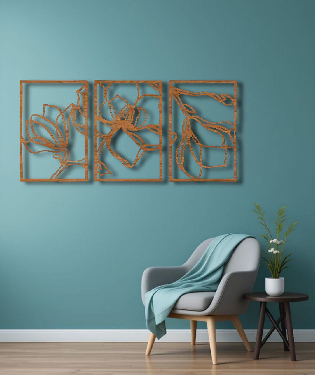 Three-piece floral wooden wall art in matte brown finish mounted above a wooden slatted console table in a modern interior setting