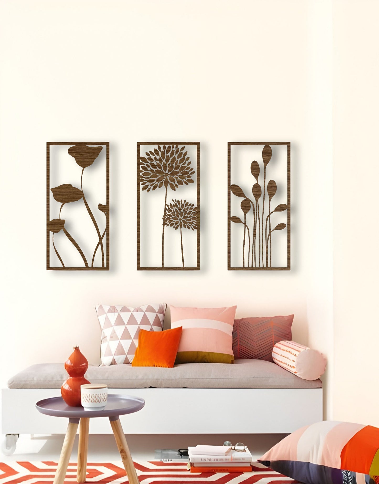 Three-piece botanical wooden wall art set in natural wood brown finish, displaying floral silhouettes on a neutral wall with cozy, modern interior decor.