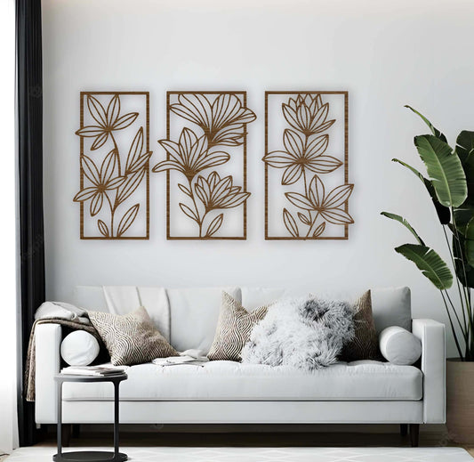 Rustic wood brown floral wall art panels arranged in a set of three, featuring botanical designs on a cream-colored wall above classic furniture