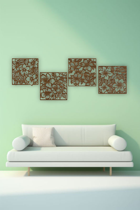 "Modern living room with a white L-shaped sofa and yellow accents, featuring a set of four black wooden laser cut floral wall art panels mounted on a white wall. Each panel displays intricate flower and leaf patterns, arranged in a staggered layout above the couch."