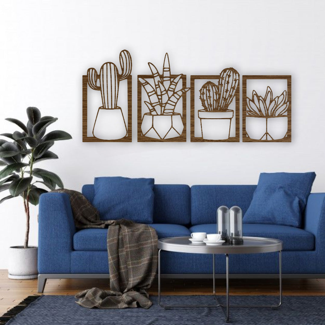 Set of four wooden cactus and succulent wall art panels in wood brown, mounted above a turquoise and wood children’s study desk in a bright, modern kids’ room