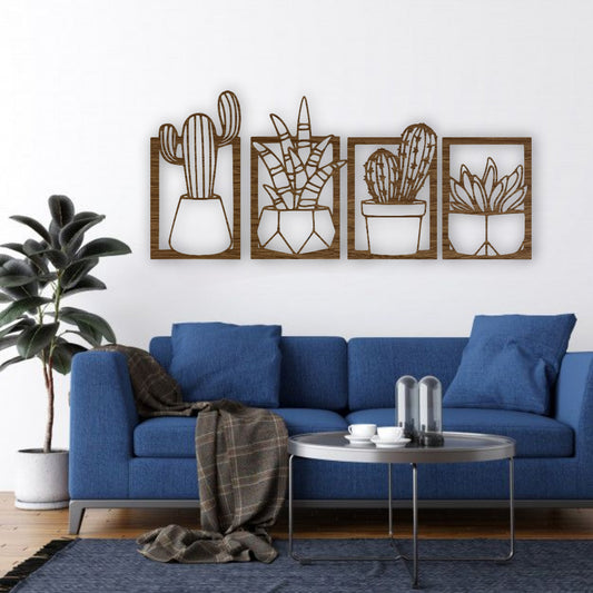 Set of four wooden cactus and succulent wall art panels in wood brown, mounted above a turquoise and wood children’s study desk in a bright, modern kids’ room