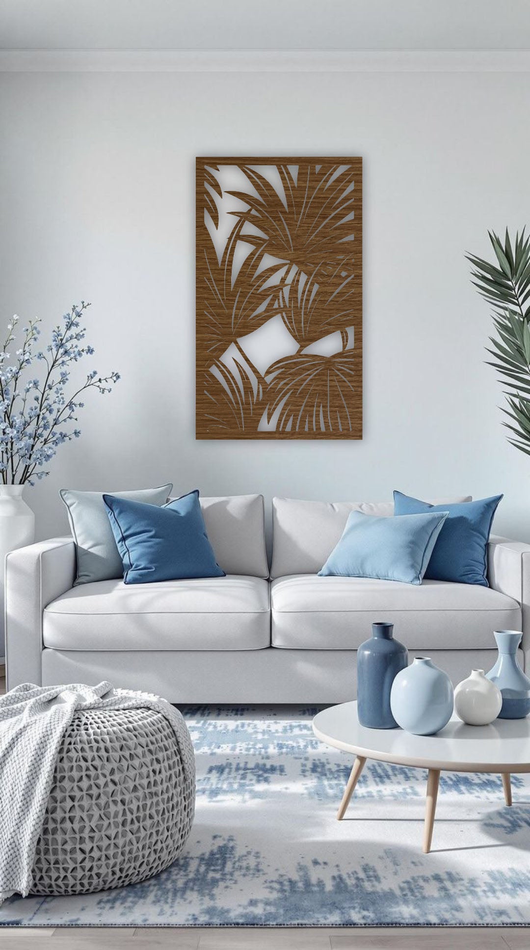 Wood brown tropical leaf wall decor panel measuring 16x28 inches, mounted in a modern neutral-toned interior, featuring warm wood accents and green plants