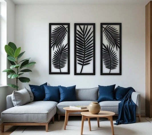 Palm leaf wooden wall panels in black finish displayed in a contemporary living room with a concrete textured background.