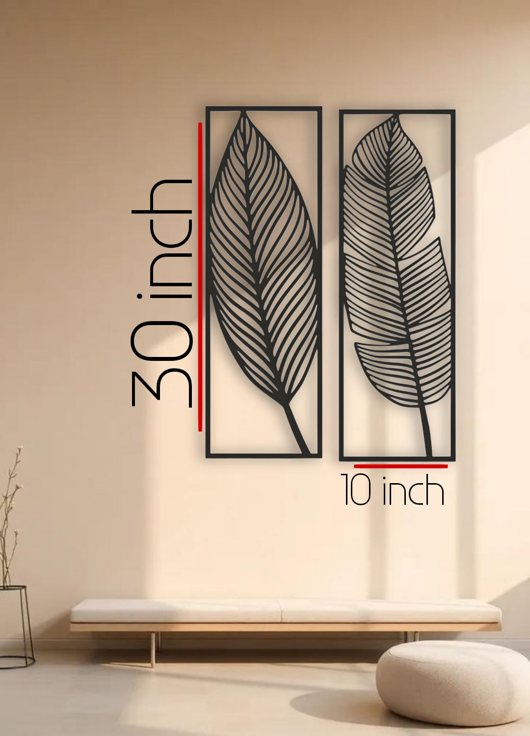 tall black woodeTwo n wall art panels with leaf designs, each 30 x 10 inches, mounted vertically above a sage green sectional in a modern living room