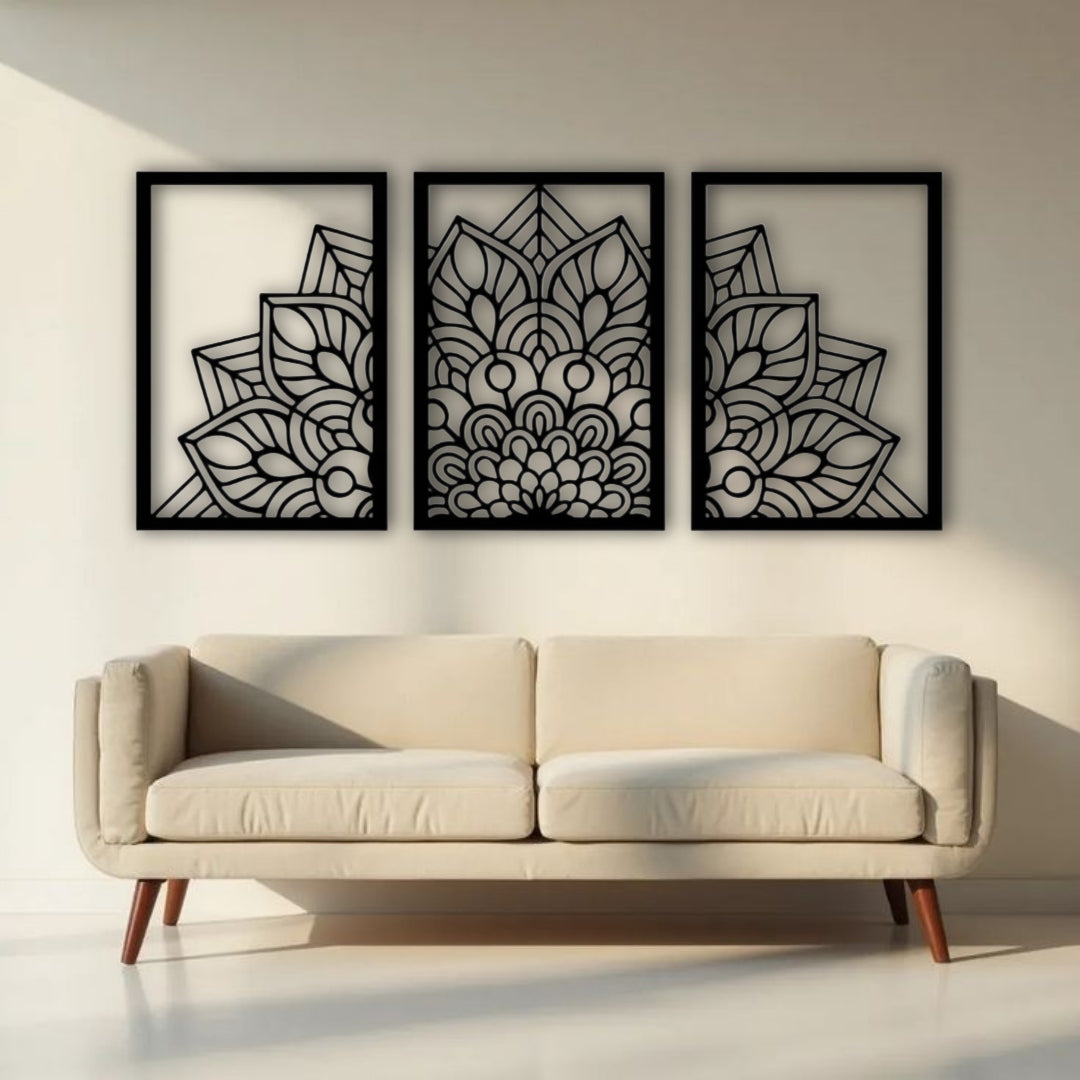 "Three-panel black wooden laser cut mandala wall art displayed above a beige modern sofa in a minimalist living room. Each panel features a symmetrical floral mandala design with clean geometric detailing, creating a balanced and artistic focal point."