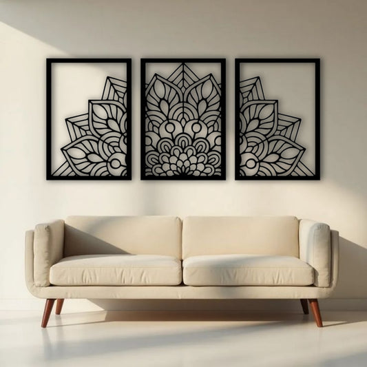 "Three-panel black wooden laser cut mandala wall art displayed above a beige modern sofa in a minimalist living room. Each panel features a symmetrical floral mandala design with clean geometric detailing, creating a balanced and artistic focal point."