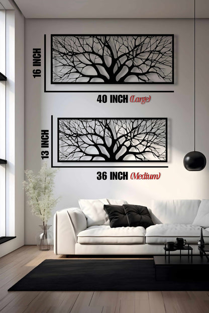 Wall art of black tree branches with size measurements in a living room.