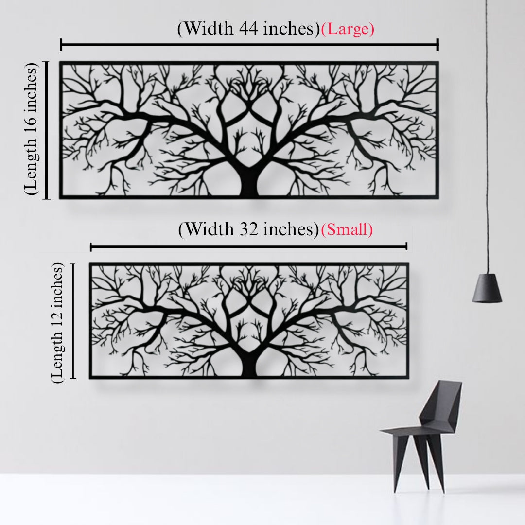 Tree branch wall art with measurements on a white wall.