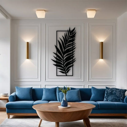 Modern black wooden wall art featuring a vertical palm leaf design, enhancing minimalist and tropical-inspired interiors.