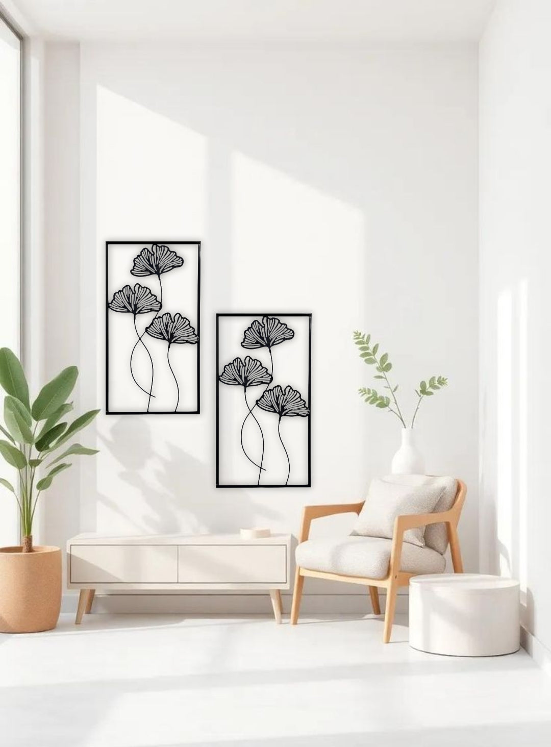 "Minimalist black floral wooden wall art displayed in a modern bright living room"