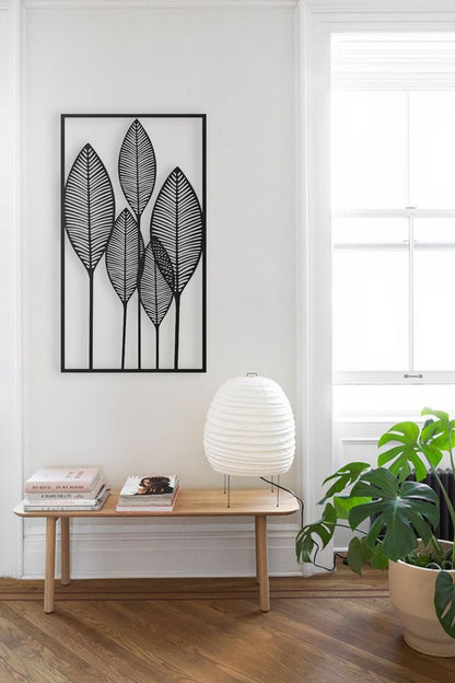 Modern wooden wall art with black leaf design for home decor