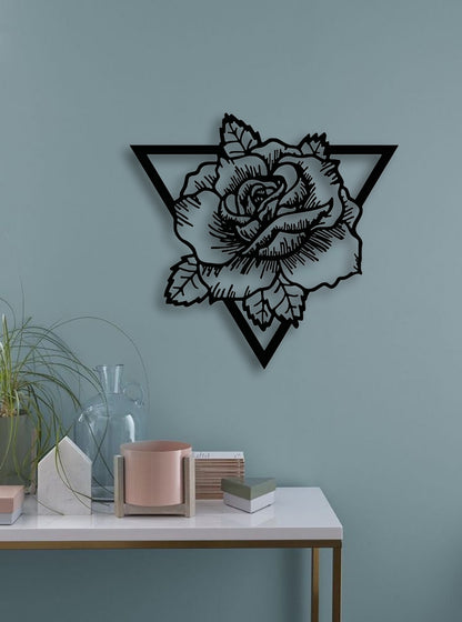 Geometric rose wall art in black wood finish, styled on a teal wall above a modern console table with minimalist décor elements.
