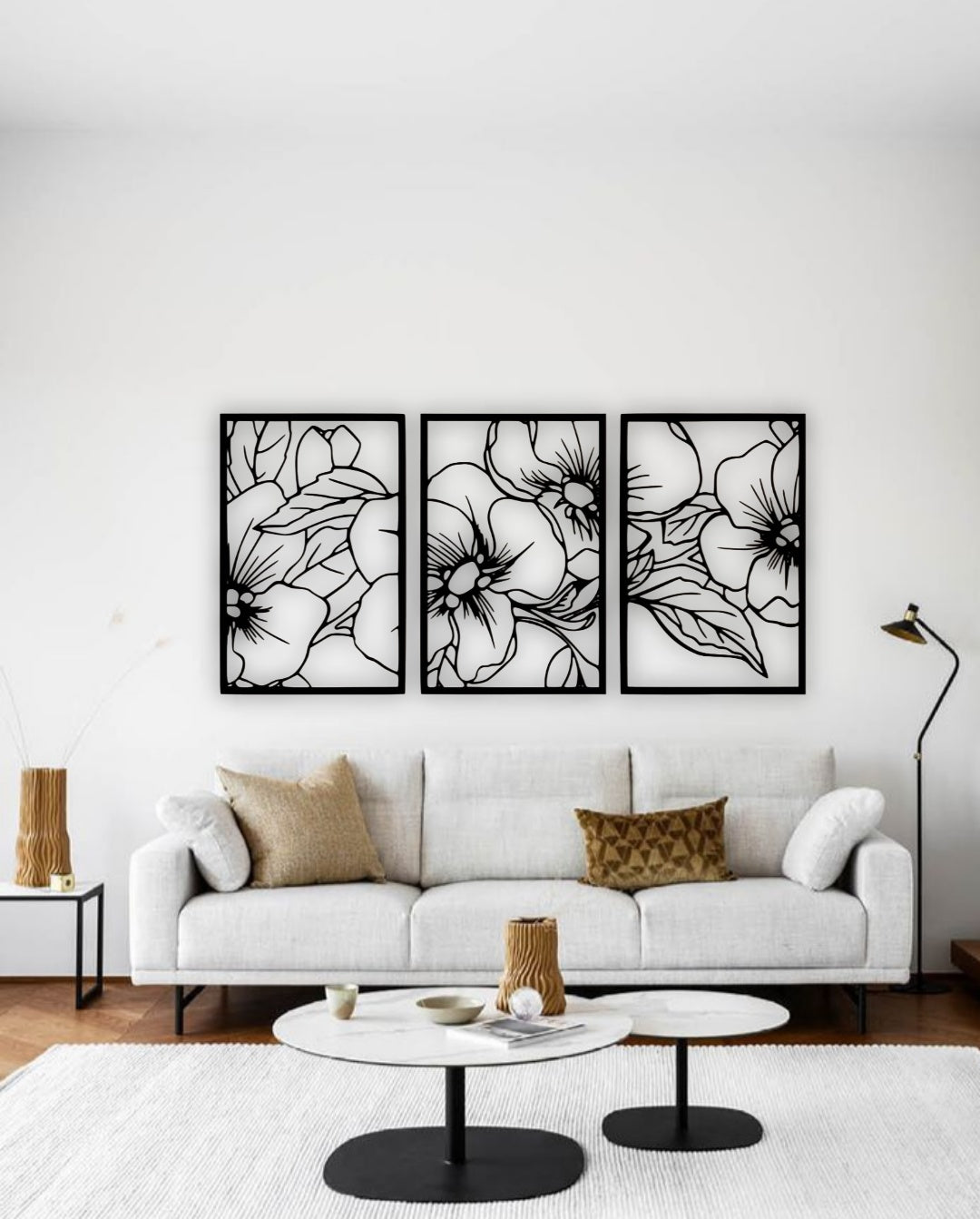 Elegant three panel wooden wall art with floral and leaf design in black color for home décor