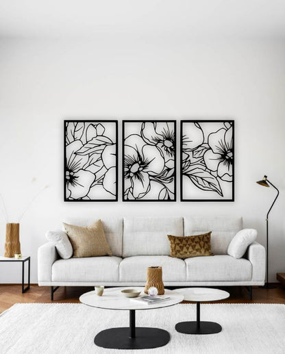 Elegant three panel wooden wall art with floral and leaf design in black color for home décor