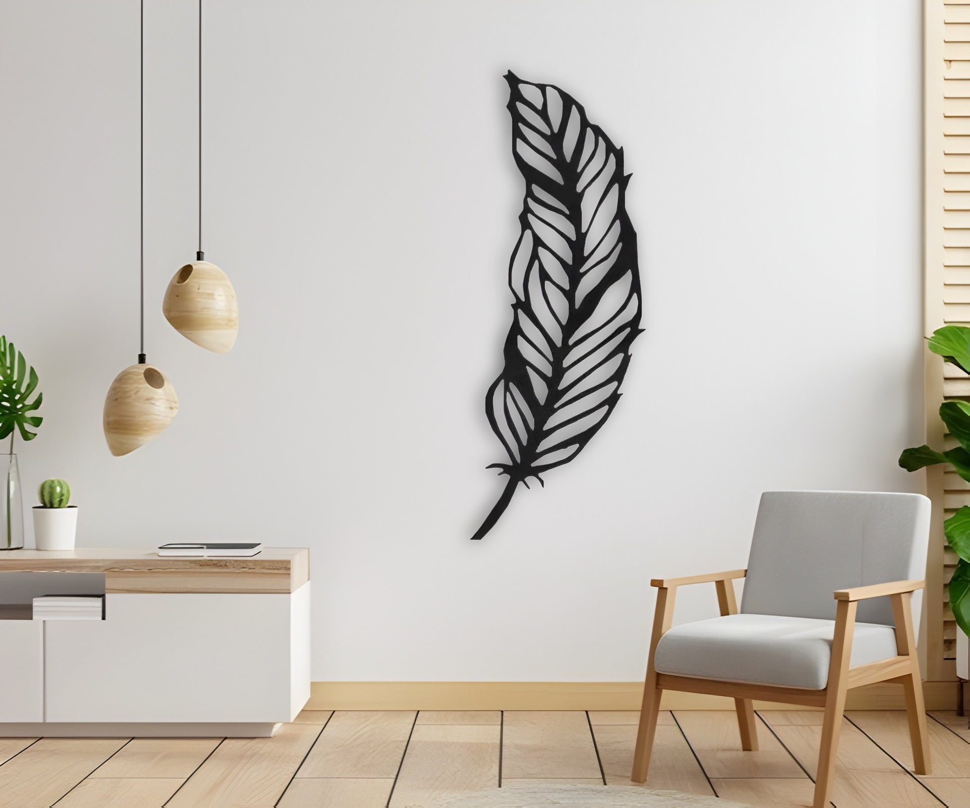 Modern black feather wooden wall art mounted on white wall in minimalist room with chair and hanging pendant lights
