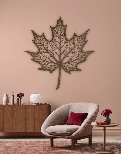 Maple leaf wooden wall art in brown color mounted on living room wall