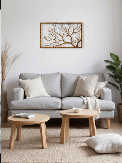 Living room with a gray sofa, wooden coffee tables, and decorative elements.