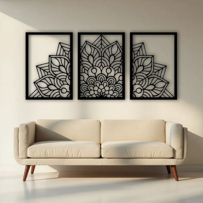 "Three-panel black wooden laser cut mandala wall art displayed above a beige modern sofa in a minimalist living room. Each panel features a symmetrical floral mandala design with clean geometric detailing, creating a balanced and artistic focal point."