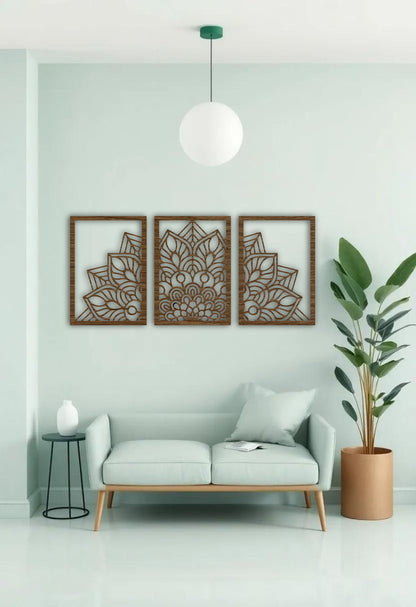 "Three-panel black wooden laser cut mandala wall art displayed above a beige modern sofa in a minimalist living room. Each panel features a symmetrical floral mandala design with clean geometric detailing, creating a balanced and artistic focal point."